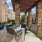 Outdoor grilling station next to the community pool at Alto Highland Park